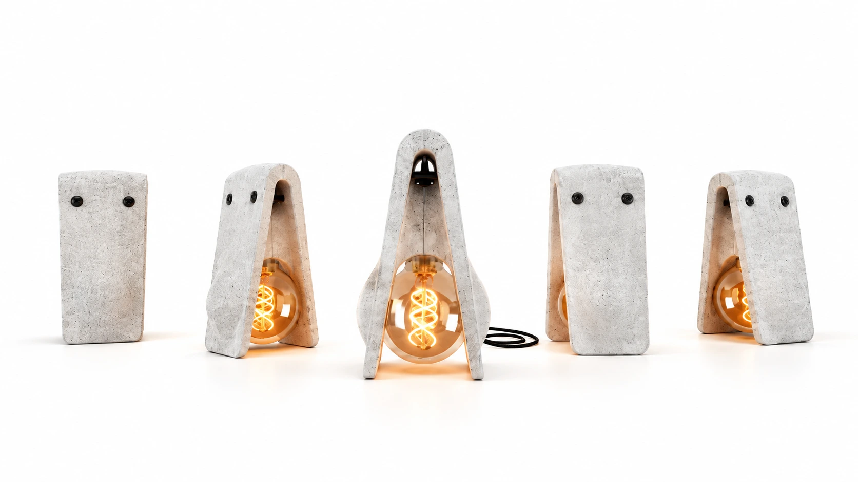Collection de lampes Jusa en béton brut, éclairées d’une lumière chaude